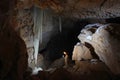 Caver in Dachstein Mammut Cave. Royalty Free Stock Photo