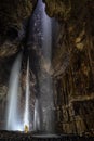 Caver at the end of the Line in Gaping Gill