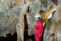 Caver logging survey data during cave mapping Royalty Free Stock Photo