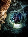 Cavern diver descends a chimney tunnel in the Blue Room at Jug Hole, Itchetucknee Springs State Park, Florida Royalty Free Stock Photo