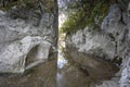 cavernous rock formations in the shape of a gorge belonging to the source of the river Alviela Royalty Free Stock Photo