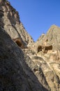 The caves of the rock monastery of Selime, carved into the mountains in the valley of Ihlara, Cappadocia, Turkey Royalty Free Stock Photo