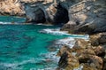 The caves of the elevated rocky shore of Cape Greco. Cyprus Royalty Free Stock Photo