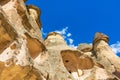 Caves in Fairy Chimneys rock formation Cappadocia Turkey Royalty Free Stock Photo