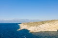 The caves in the rocky and limestone cliffs , in Europe, Greece, Crete, Matala, By the Mediterranean Sea, in summer, on a sunny