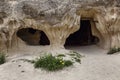 Caves in the sandy mountains of Cappadocia. Beautiful landscape. Close-up