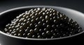 Caviar in a black bowl Royalty Free Stock Photo