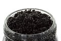 Caviar black in a glass jar isolated on white Royalty Free Stock Photo