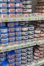 Caviar paste on shelves of food store. Canned food products in supermarket