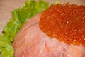 Caviar with red fish - seed or trout on green lettuce salad as side dish. healthy food and culinary. cuisisne. dieting and eating. Royalty Free Stock Photo