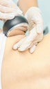 Cavitation rf body treatment. Female ultra sound lipo machine. Spa contouring. Doctor hands Royalty Free Stock Photo