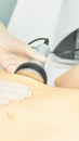 Cavitation rf body treatment. Female ultra sound lipo machine. Spa contouring. Doctor hands Royalty Free Stock Photo