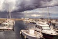 Cavo, Island of Elba Province of Livorno Italy - 20 September 2021 Port of Cavo with dramatic sky before thunderstorm Royalty Free Stock Photo