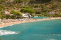 Cavoli, Elba Island, Province of Livorno Italy - September 17 2021 View over sandy colorful beach of little village Cavoli at end