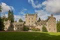 Front of Cawdor Castle with turret and drawbridge with bell and Stags Head Buckel Be Mindfull emblem. The castle has been known