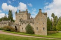 Front of Cawdor Castle with turret and drawbridge with bell and Stags Head Buckel Be Mindfull emblem. The castle has been known