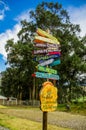 CAYAMBE, ECUADOR - SEPTEMBER 05, 2017: Informative sign of distance from Cayambe, of different countries written over a Royalty Free Stock Photo