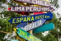 CAYAMBE, ECUADOR - SEPTEMBER 05, 2017: Informative sign of distance from Cayambe, of different countries written over a Royalty Free Stock Photo