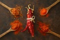 cayenne pepper on wooden spoon spices and dried chilli peppers background . Royalty Free Stock Photo