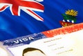 Cayman Islands immigration document close up. Passport visa on Cayman Islands flag. Cayman Islands visitor visa in passport,3D Royalty Free Stock Photo