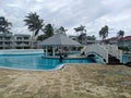 Cayo Coco, Cuba, 16 may 2021: The hotel employee cleans the pool area before the arrival of vacationers