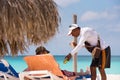 CAYO LARGO, CUBA - MAY 10, 2017: Seller of drinks on the beach Playa Paradise. Royalty Free Stock Photo