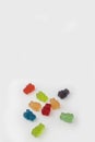 Colorful set of CBD infused medicinal candy gummies used for healing on a plain white background