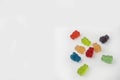 Colorful set of CBD infused medicinal candy gummies used for healing on a plain white background