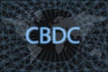 CBDC Central Bank Digital Currency Abstract Cryptocurrency. With a dark background and a world map. Graphic concept for your