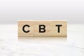 CBT on Wooden Blocks - Cognitive Behavior Therapy Mental Health Concept