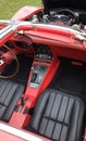 Cca 1960 Chevrolet Corvette, red leather interior with black seats.