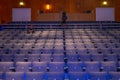 CCB concert hall audience with empty chairs, just one person sitting and a broadcast camera in Lisbon.