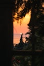 Ccenic view of a residential home's window during sunset