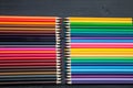 Ccolor pencils on dark wooden background Royalty Free Stock Photo