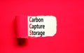 CCS Carbon capture storage symbol. Concept words CCS Carbon capture storage on beautiful white paper. Beautiful red paper