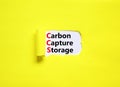 CCS Carbon capture storage symbol. Concept words CCS Carbon capture storage on beautiful white paper. Beautiful yellow paper
