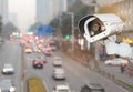 CCTV with Blurring City in background.CCTV with Blurring City in background.CCTV Security camera with blurring traffic jam in chen Royalty Free Stock Photo