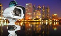 CCTV with Blurring City in night background. Royalty Free Stock Photo