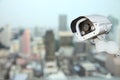 CCTV with Blurring City in night background. Royalty Free Stock Photo