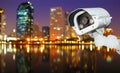 CCTV with Blurring City in night background. Royalty Free Stock Photo