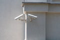 CCTV camera attached on the wall of the building, monitoring and tracking, monitoring the situation Royalty Free Stock Photo