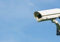 The CCTV camera background blue sky Royalty Free Stock Photo