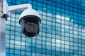 CCTV camera with modern financial buildings in downtown, property and financial security concept Royalty Free Stock Photo