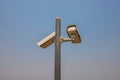 CCTV camera in security system in urban city with sky background in security concept Royalty Free Stock Photo