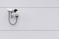 CCTV camera on wall with copy space Royalty Free Stock Photo