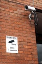 CCTV camera and warning notice