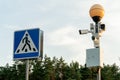 CCTV cameras in a protective white case on a lamppost. Outdoor video surveillance camera installed on the streets of the city for