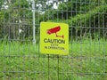 CCTV or Closed-circuit Television warning sign is hung on the fence as a warning to those who intend to trespass.