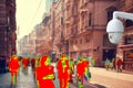 CCTV. Crowds of people walking down the street. Thermal imager filter. Concept of modern video surveillance technologies