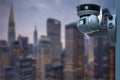 CCTV monitoring, security cameras. Backdrop with views of the city during twilight. Royalty Free Stock Photo